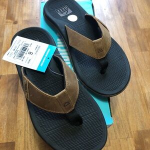 NIB Santa Fe, black and tan REEF￼ size 8 men flip flop